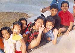 Children playing on slide